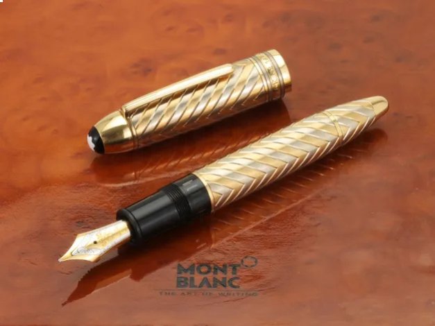 MONTBLANC MEISTERSTUCK 149 SOLID GOLD CHEVRON - CANETA TINTEIRO (PISTÃO). CORPO DE OURO AMARELO E BRANCO 18K. 